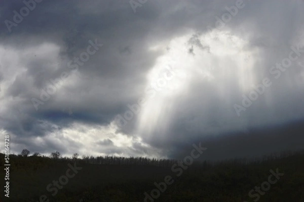 Obraz cloudy weather with sun rays