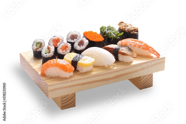 Obraz Maki Sushi Rolls on bamboo board isolated on White background with clipping path