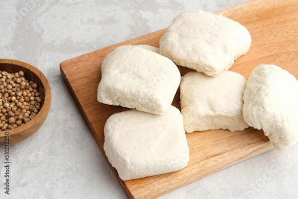 Fototapeta Tahu Putih or Tofu, one of raw ingredient food made from fermented soybean extract. 
