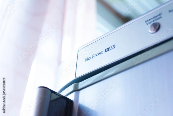 Obraz The inscription no frost on the body of the refrigerator close-up, selective focus