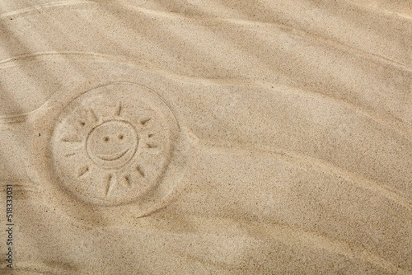 Fototapeta Sand with free space and sun rays on a summer day with a free space