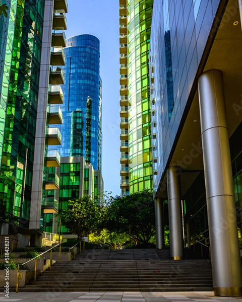 Obraz between tall building of city skyline