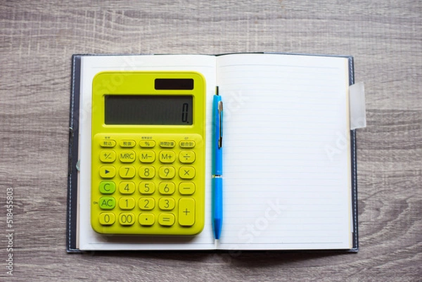 Fototapeta 計算機と手帳とペン
