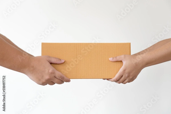Fototapeta Postal service sending paper cardboard box to customer. Shipping service arrival and send to customer address.