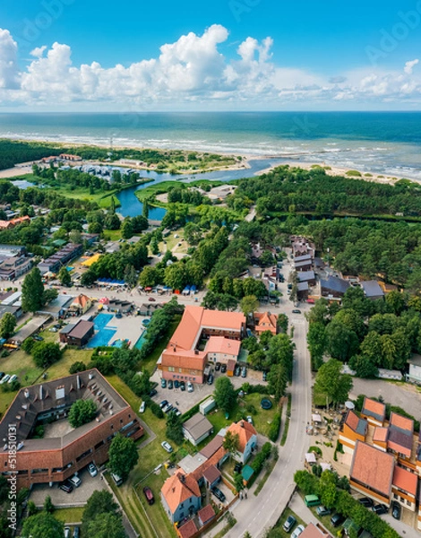 Obraz Seaside town Sventoji in Lithuania on Baltic sea shore, very visited summer tourist location for cheap accommodation and party, sandy beach