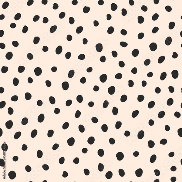 Fototapeta Cute black hand drawn polka dot on beige background. Vector seamless jumble brush spots pattern. Random dots, circles, animal skin. Design for fabric, wallpaper, textile, wrapping paper, packaging.