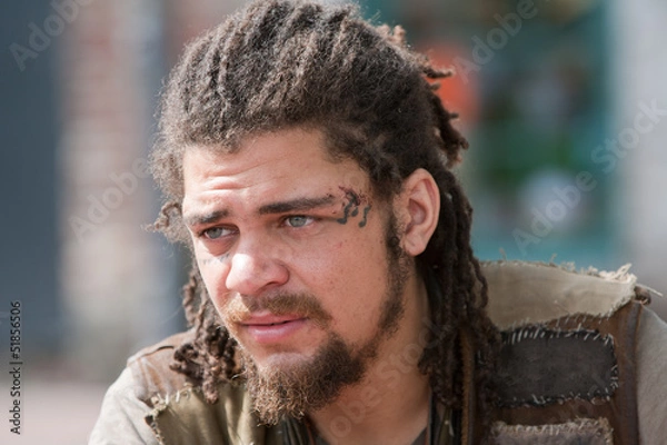 Obraz Portrait young rebel with dreadlocks and tattoos
