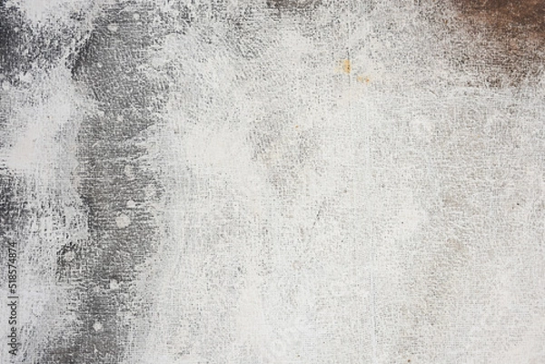 Fototapeta black and white texture of cement wall The pattern is formed by stagnant water.