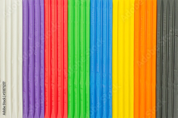Fototapeta Background of brightly colored modelling clay