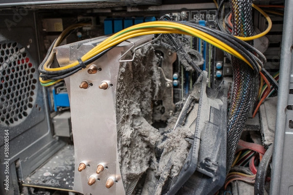 Fototapeta Close-up of a cpu cooling system heatsink contaminated with dust that can no longer cool the computer