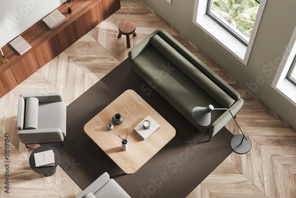 Fototapeta Top view of light lounge interior with chairs and couch, drawer and window