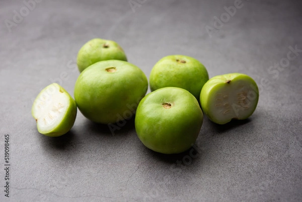 Fototapeta Raw Tinda, tinde also called dhemse, Apple Gourd, Baby Pumpkin, Indian Squash Round Melon.