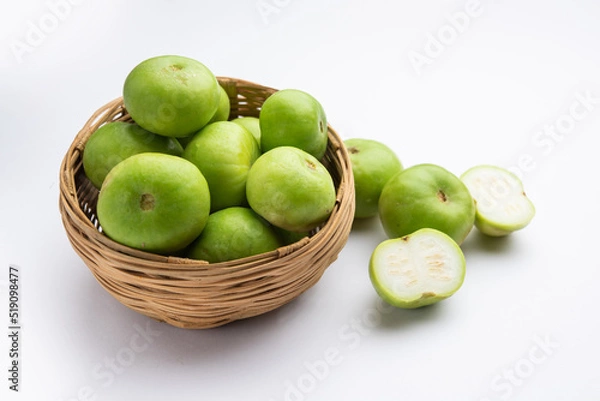 Fototapeta Raw Tinda, tinde also called dhemse, Apple Gourd, Baby Pumpkin, Indian Squash Round Melon.