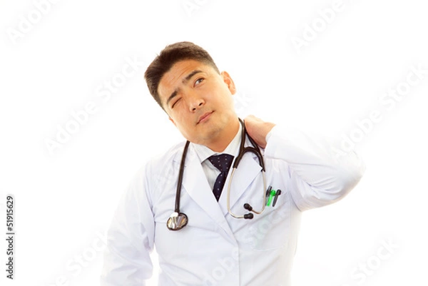 Fototapeta 疲れた表情の医師