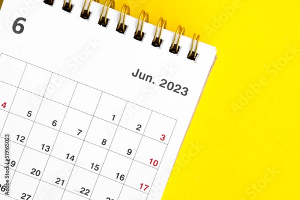 Fototapeta june calendar 2023 on a yellow background.
