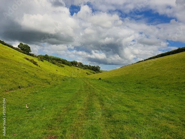 Obraz Dry valley landscape with sky and clouds