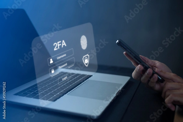 Fototapeta Person using laptop and touching virtual screen for two-factor authentication for safety use of social networks and access to information privacy