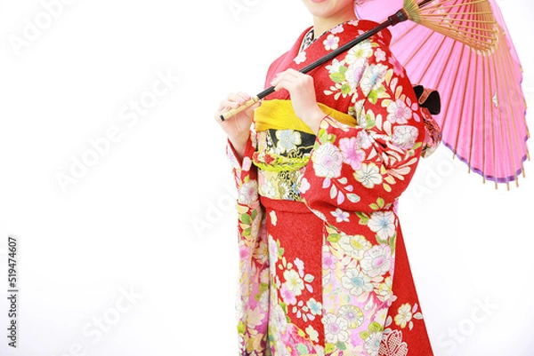 Fototapeta 赤い振袖を着て傘を持った女性