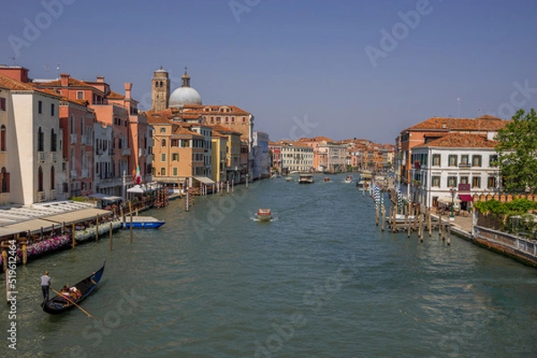 Obraz Grand channel in Venice, holiday season, gondola and boats in the background of the traditional Venetian architecture
