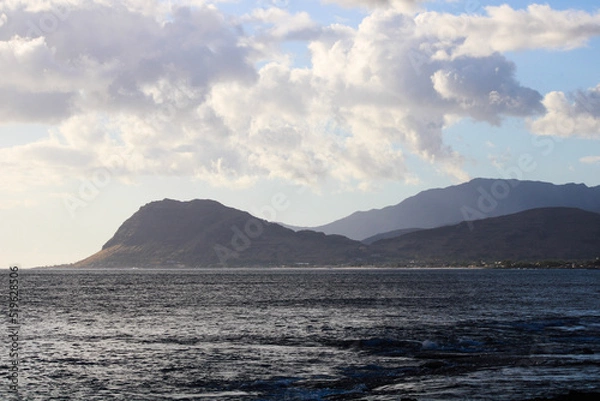 Fototapeta clouds over the sea