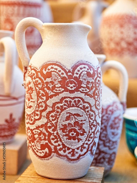 Fototapeta Different handmade ceramic pots to sell painted