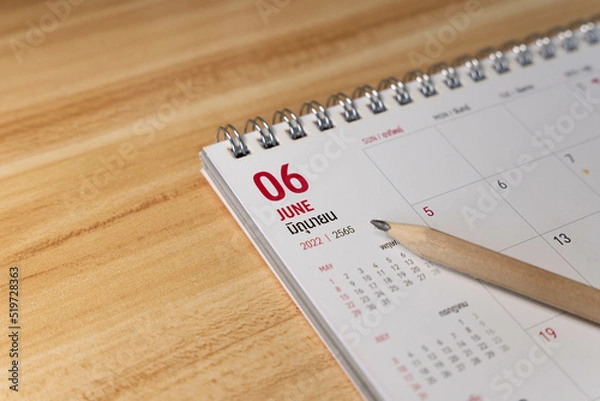 Obraz Jun month 2022 Calendar page with pencil business planning concept on wooden background