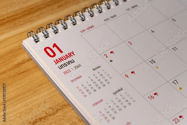 Obraz Jan month 2022 Calendar page on wooden background