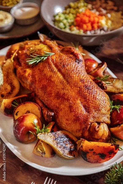 Fototapeta Fried chicken with pear, rosemary