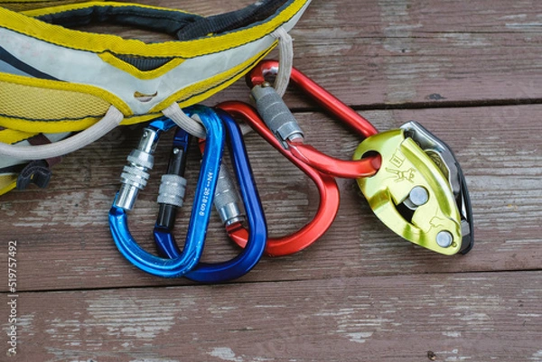 Obraz Climbing equipment on wooden background