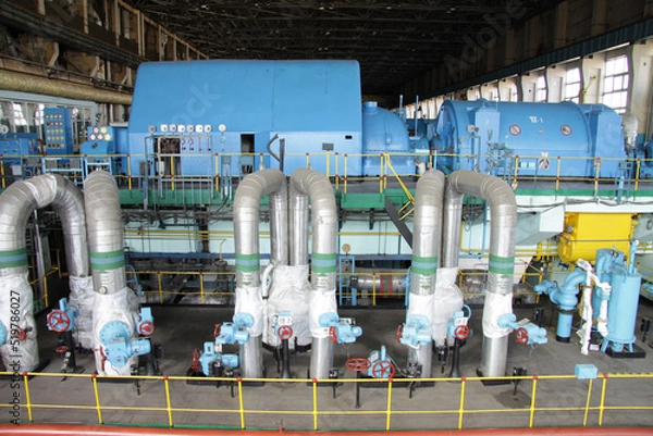 Fototapeta CHP. Huge production of heat generation for the population. Heat electro center. Large-scale enterprise with wires and turbines.