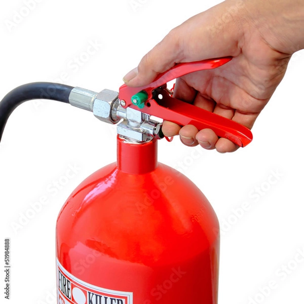 Obraz Holding fire extinguisher isolated over white background
