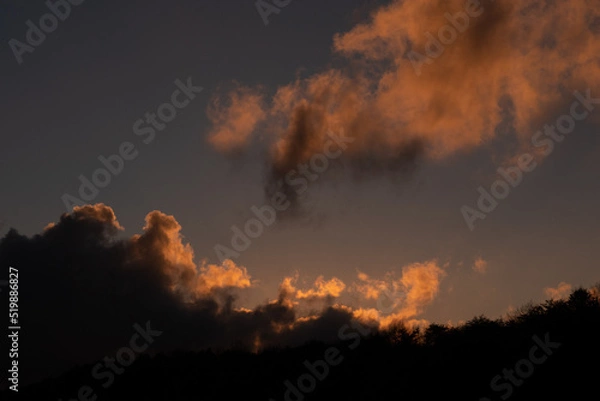 Fototapeta sunset in the clouds