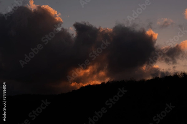 Fototapeta sunset in the clouds