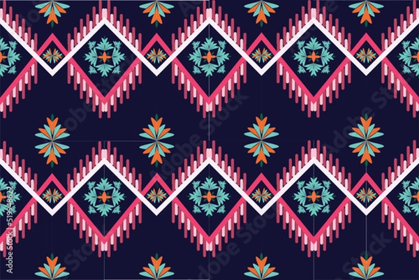 Fototapeta square colored yarn decorated with colorful flowers Beautifully woven on a dark circular background. for clothing wallpaper