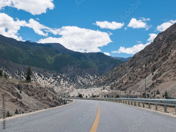 Obraz Winding asphalt road stretched into mountains