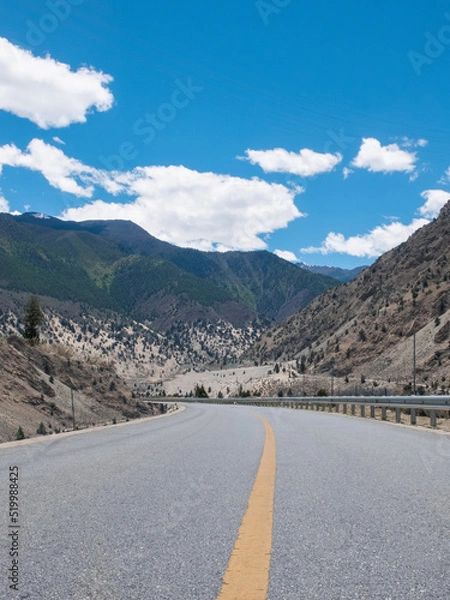 Obraz Winding asphalt road stretched into mountains