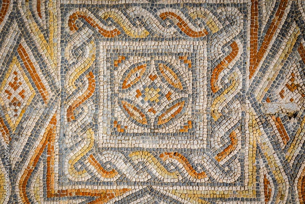 Fototapeta Ancient roman pavement mosaic from the portuguese archaeological place of Villa Cardillium located in the city of Torres Novas - Portugal