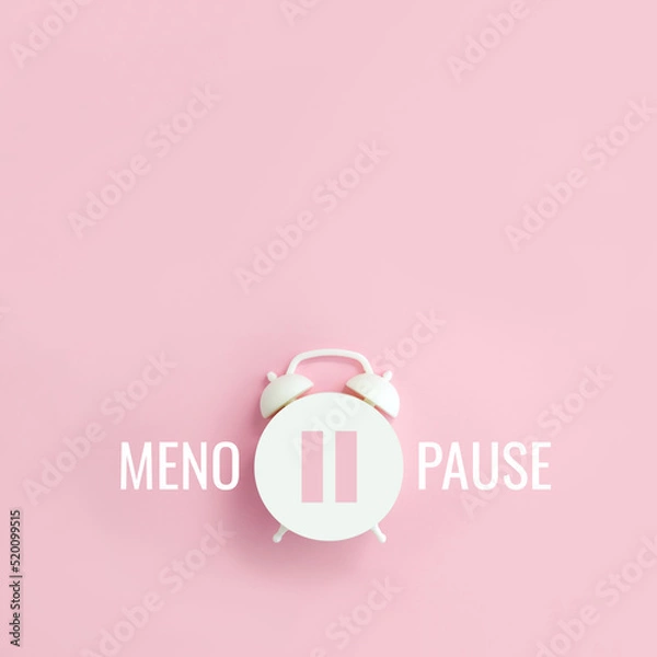 Fototapeta Word Menopause and pause sign on alarm clock on pink background. Minimal creative concept hormone replacement therapy. Сopy space, square orientation