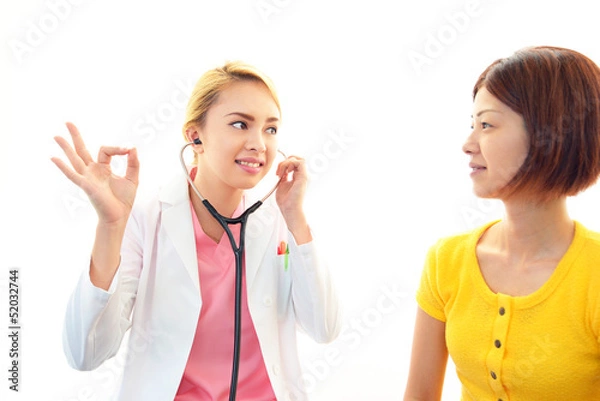 Fototapeta 診察中の女医