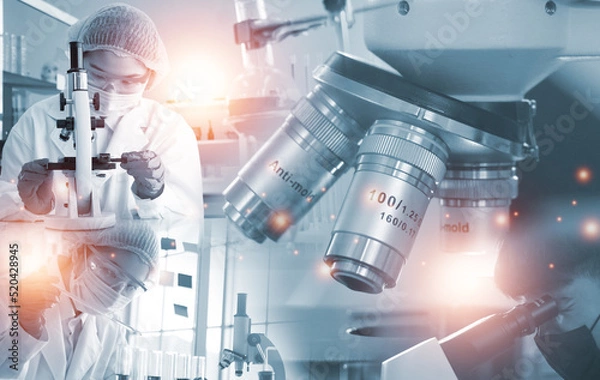 Fototapeta Double exposure microscope Young woman scientific using equipment in the laboratory for research.Biotechnology,development,chemical,study,vaccine,COVID-19. Photo concept experimentation and research.