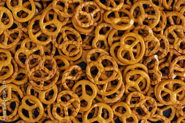 Obraz Background of salted pretzel. Top view