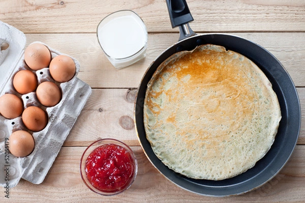 Obraz Pancake with eggs and jam on breakfast