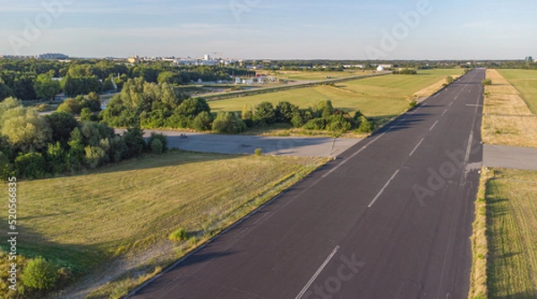 Fototapeta Aerial view from plane landing. Runway of former airport in Neubiberg, south Germany seen from above