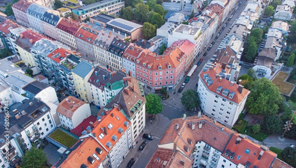 Fototapeta Munich Streets near the city centre seen from above aerial top view of a German city in summer