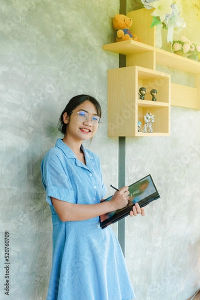 Obraz Office girl with laptop working in the tech world
