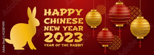 Fototapeta Chinese new year 2023 of the rabbit with realistic, rose gold and red baubles. China gold gradient text. Golden hare on a red background. Vector illustration
