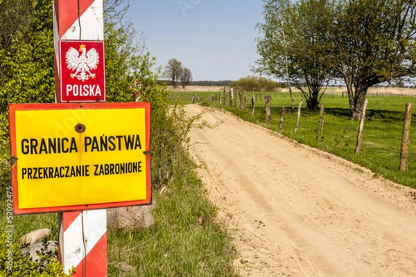 Obraz Border post with the emblem of the Poland.