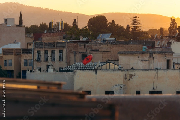 Obraz Moroccan flag on the roof of a house in the Medina