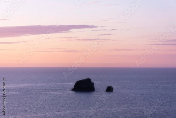 Obraz Sunset over sea with sea stack