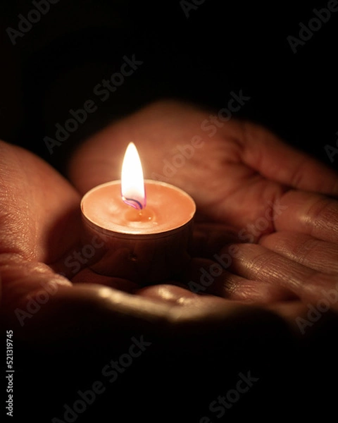 Obraz Hands holding candle